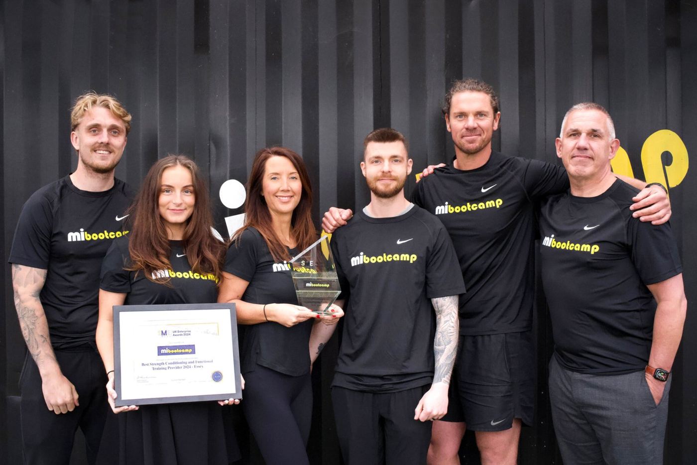 The MiBootcamp team with their award
